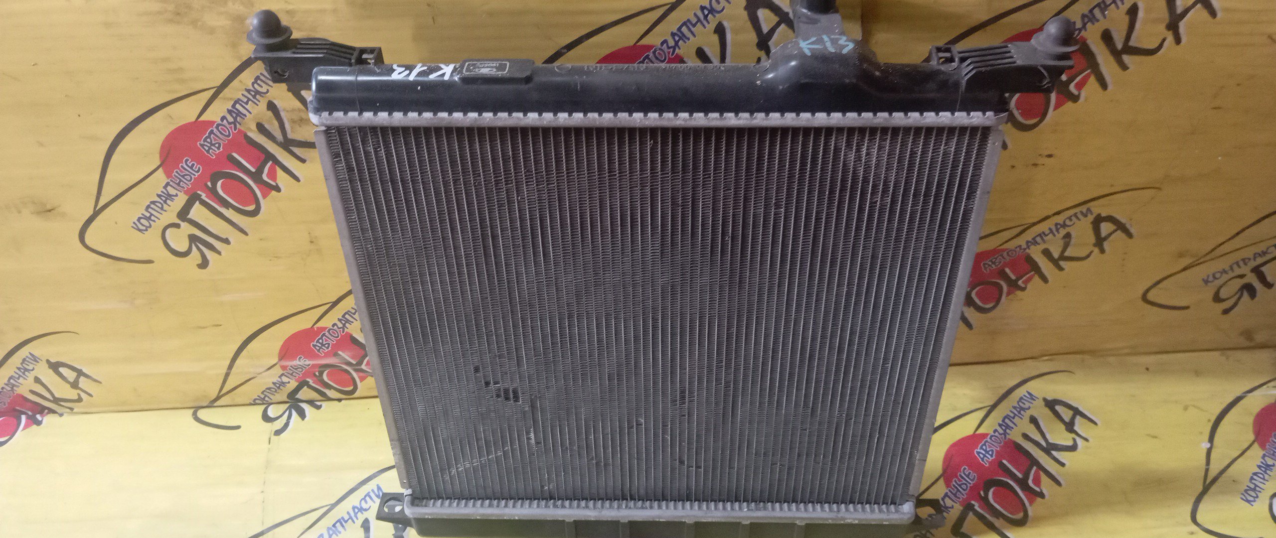 РАДИАТОР ДВИГАТЕЛЯ/NIS/MARCH/NOTE/E12/K13/NE12/NK13/HR12DE/214101HJ0A/БЕЗ ТРУБОК